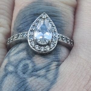 Ring featuring a pear-shaped cubic zirconia stone set in sterling silver. 935
